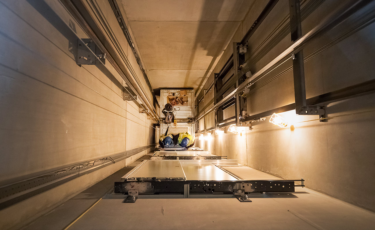 Lift Installation Lincoln transport hub multi story car park, engineers in lift shaft working