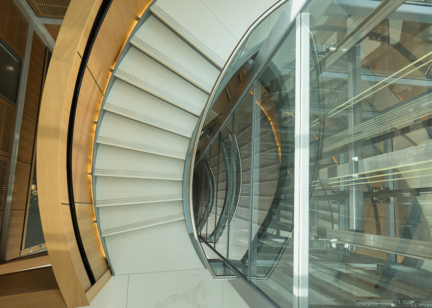 Lift Installation Oxford, dickson Poon university of oxford china centre building, spiral staircase around lift shaft