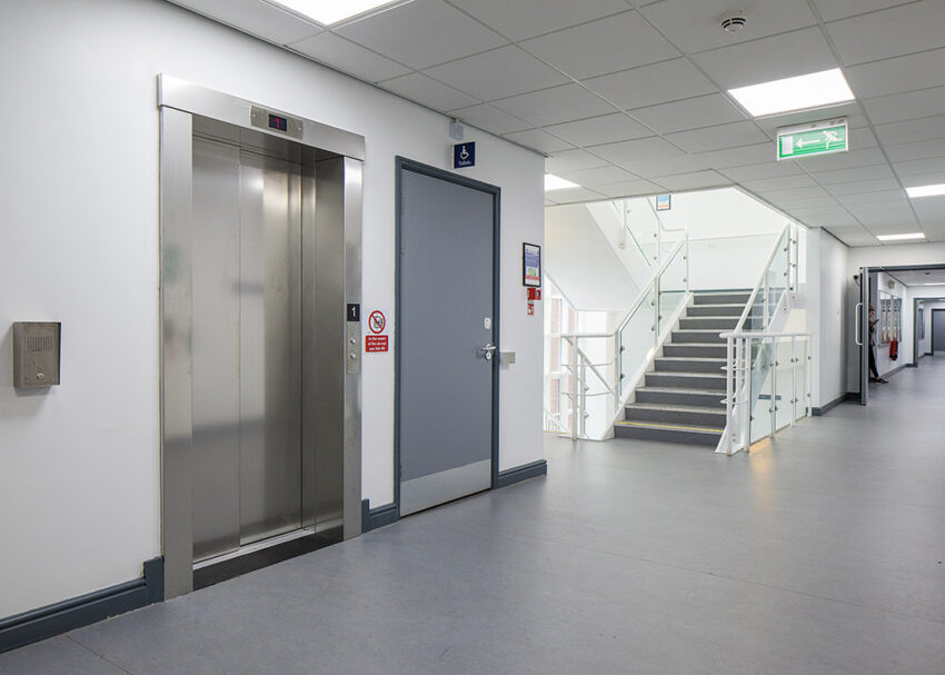 Lift Installation worcester at University of WOrcester Edward Elgar Building, brushed steel lift doors