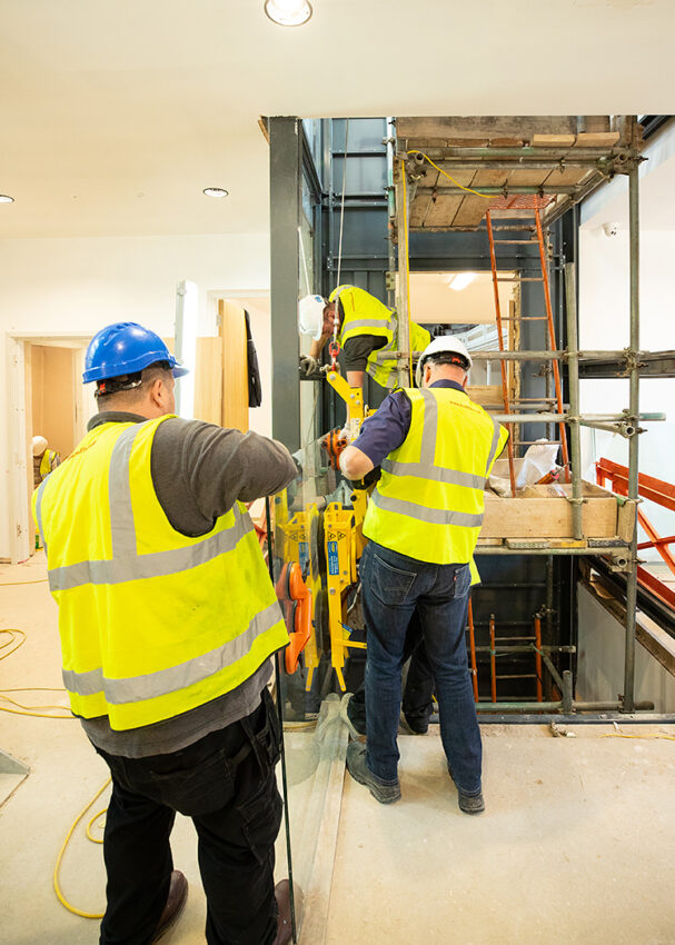 Glass Lift Installation Nottingham Trent University, University Hall, large glass lift panel installation