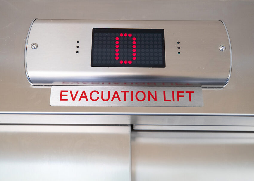 Lift Installation at Blackfriars Cambridge, evacuation lift sign
