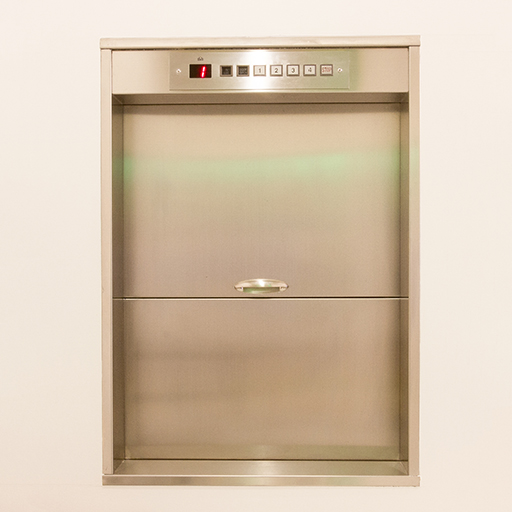 dumb waiter carrying goods from floor rot floor installation by MV Lifts