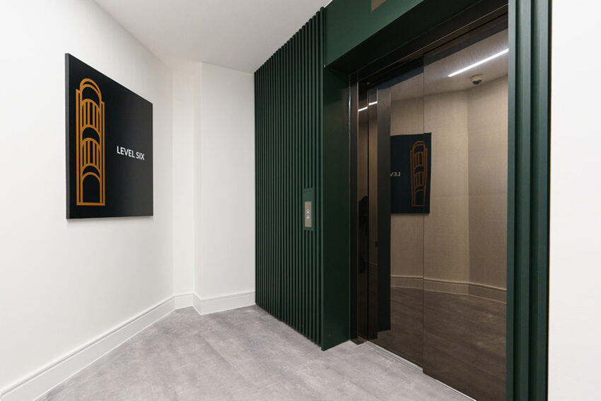 bright bronze lift doors wilsons corner, London