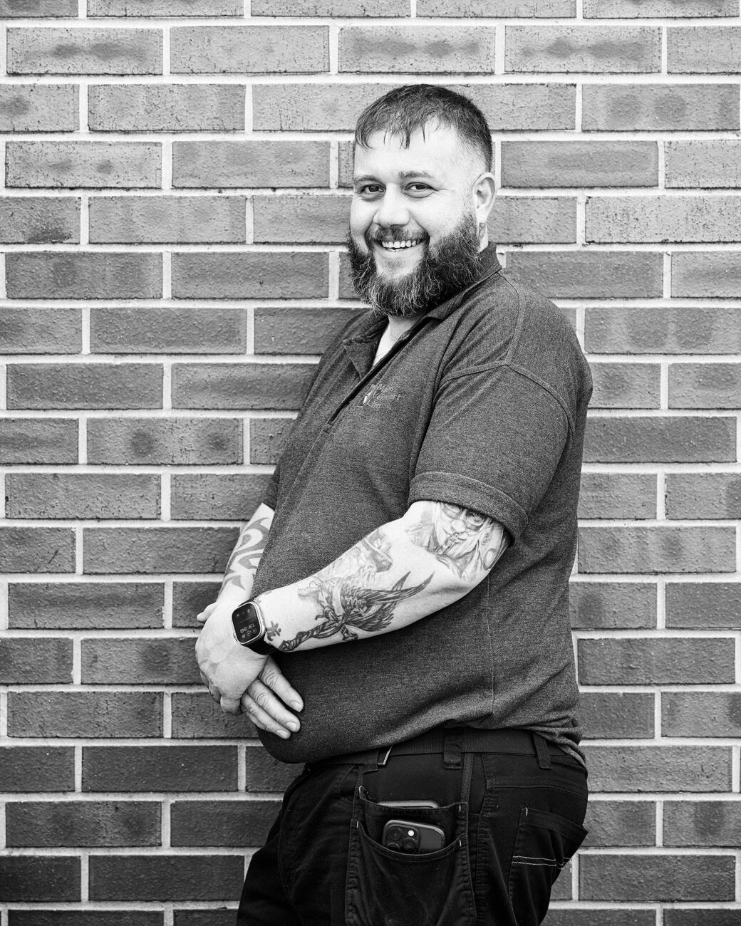 Ian Newton, senior lift repair engineer at MV Lifts standing by a wall for his feature day in the life.